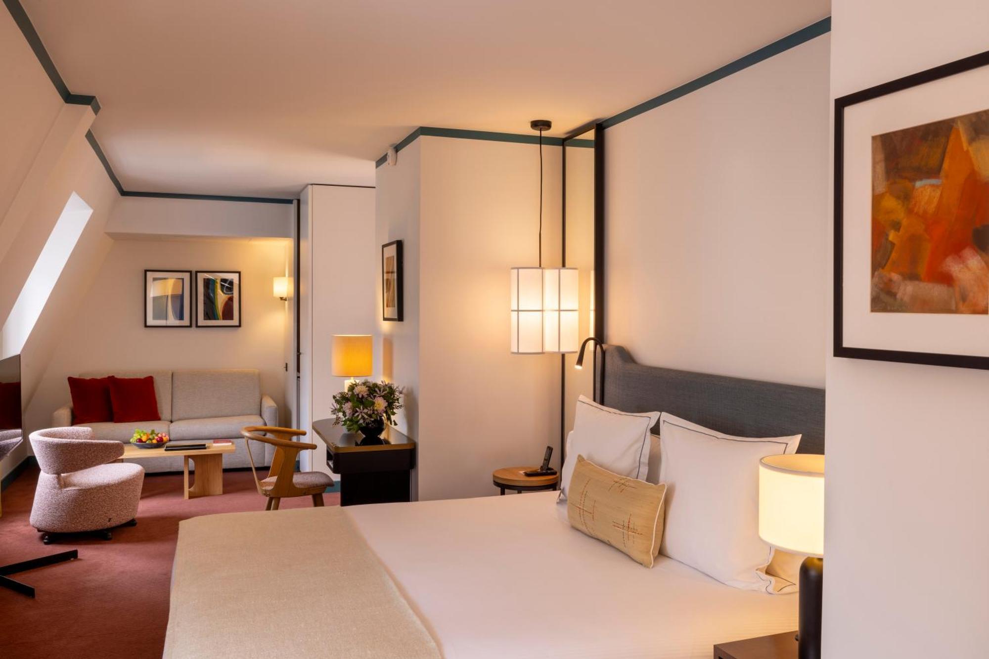 Suite avec Bouteille de Champagne Offerte et Accès au Spa & Salle de Sport